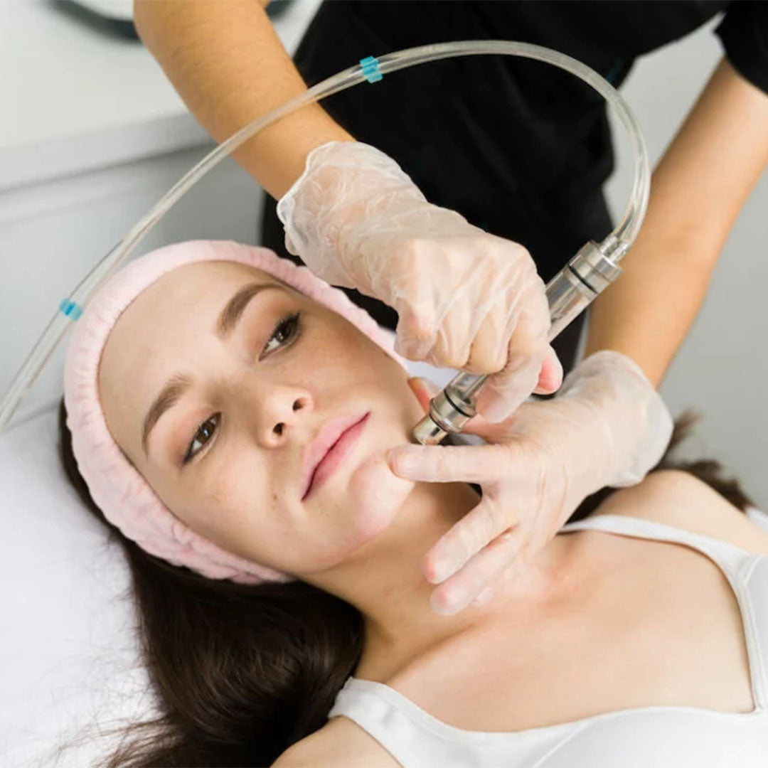 woman receiving skin care treatment