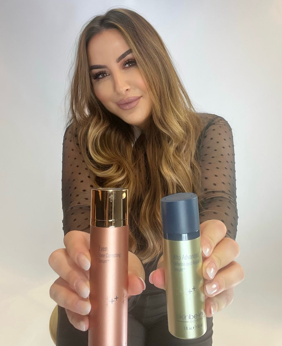 celebrity esthetician crystal koro holding skinbetter science products
